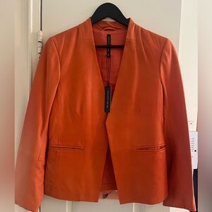 Beautiful never worn Walter Baker medium orange leather jacket with tags